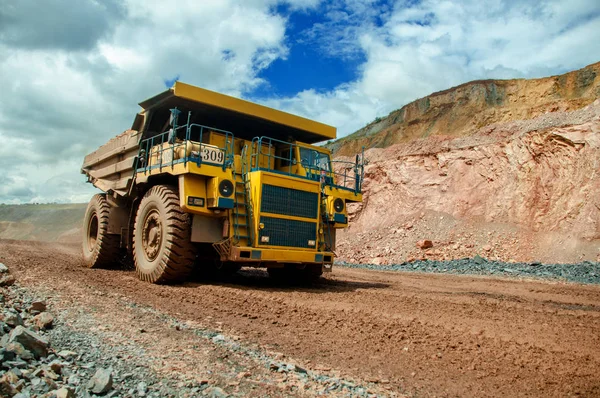 the dump truck transports iron ore. Colorful quarry. Ukraine 2017