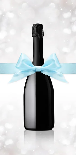 Wine bottle gift with ribbon — Stock Photo, Image