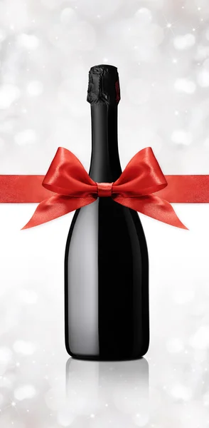 Wine bottle gift with ribbon — Stock Photo, Image