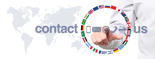 Hand touch screen display with global contact us concept text — Stock Photo, Image