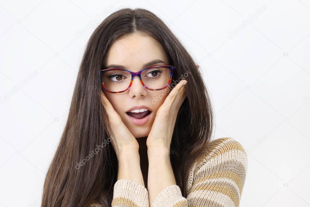 Surprised woman in glasses isolated in white background