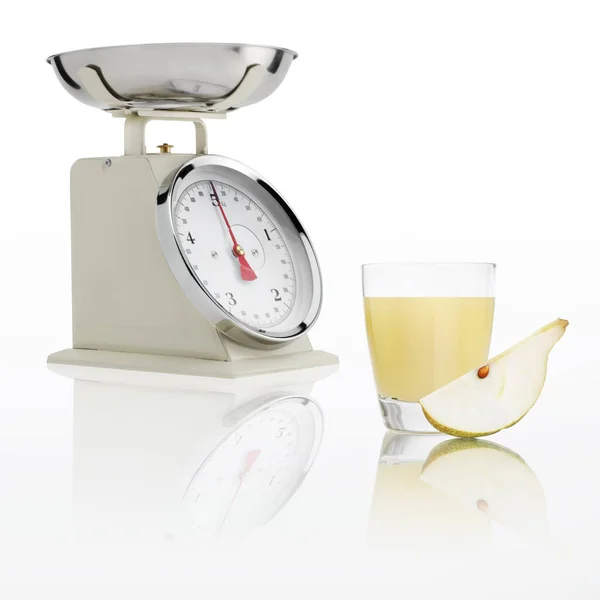 weight scale with pear juice glass isolated on white background, Balanced diet concept