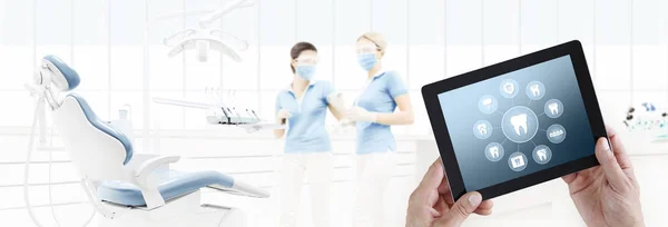 dentist hand touch digital tablet screen teeth icons and symbols