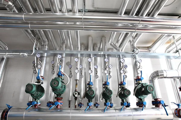Pump , manometer, pipes and faucet valves of heating system in a — Stock Image Pump , manometer, pipes and faucet valves of heating system in a Royalty Free Stock Images