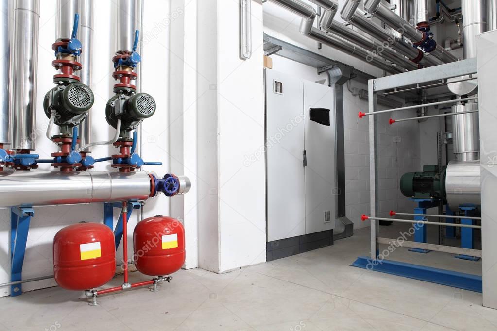 central heating and cooling system control in a boiler room