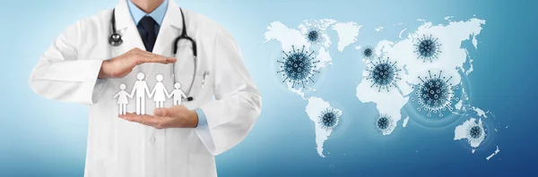 corona virus covid 19 protection concept, doctor hands protect family symbol with covid icons on the world map in the blue background, copy space and web banner template