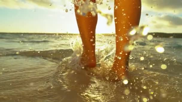 Slow Motion Young Woman Walking Sandy Beach Wets Her Feet — 비디오