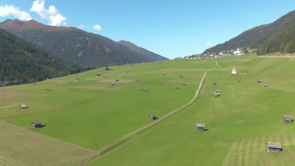 DRONE: Flying above the perfect green meadows in the Austrian countryside. — Stock Video