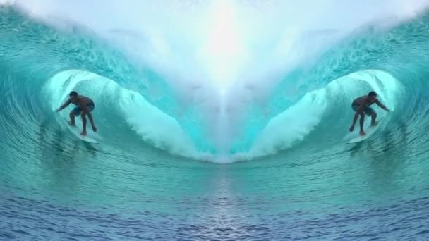 SLOW MOTION: Surferzy surfujący wewnątrz dużej fali rurki w kształcie serca — Wideo stockowe