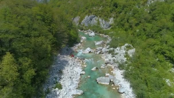 DRONE: Flying above whitewater rapids of Soca river and active tourists rafting. — Stock Video
