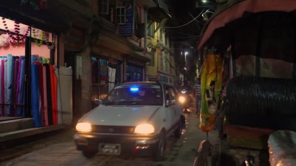 SLOW MOTION Locals on foot and motorbikes explore city streets in poor condition — Stock Video