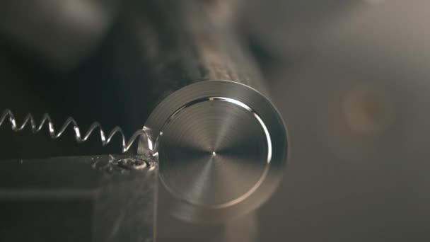 MACRO, DOF: Lathe tool cutting a small groove into the middle of a metal rod. — Stock Video