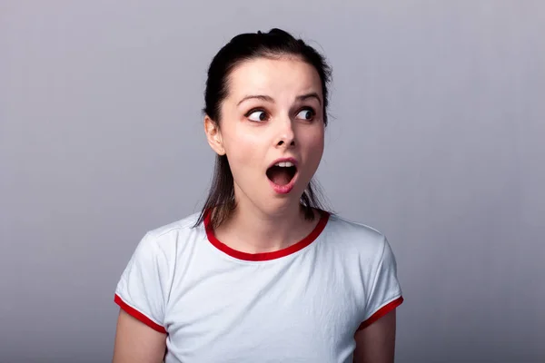 Attractive Emotional Girl Red White Shirt Gray Background — Stock Photo, Image