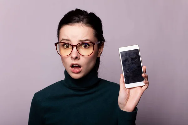 Girl Green Turtleneck Glasses Sight Communicates Phone Portrait Gray Background — Stock Photo, Image