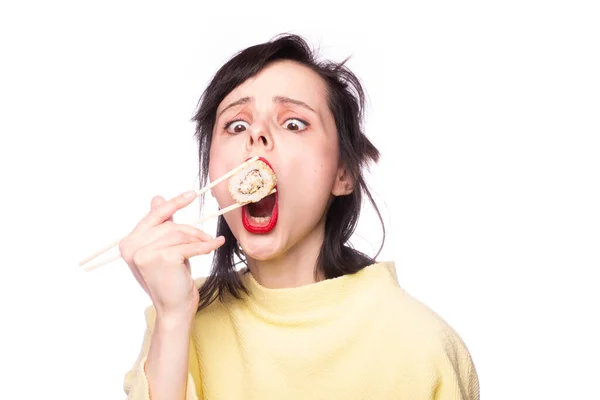 Girl Red Lipstick Her Lips Yellow Sweater Holds Sticks Sushi — Stock Photo, Image