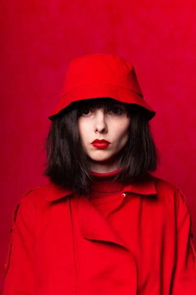 girl in red clothes, red background