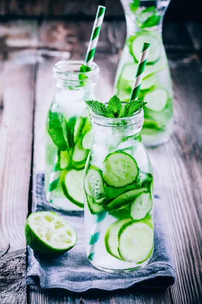 Detox water with cucumber, lime and mint