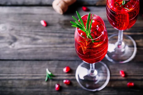 Pomegranate champagne mimosa cocktail with rosemary — Stock Photo, Image