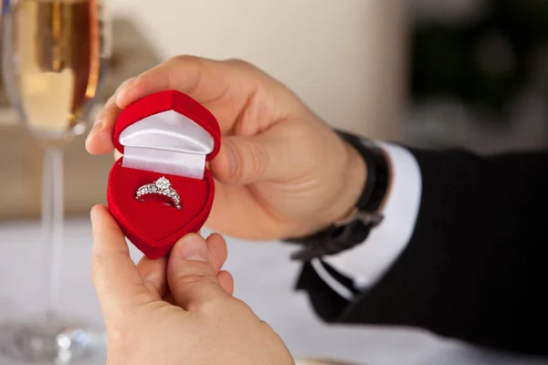 Man giving engagement box with ring. — Stock Photo, Image