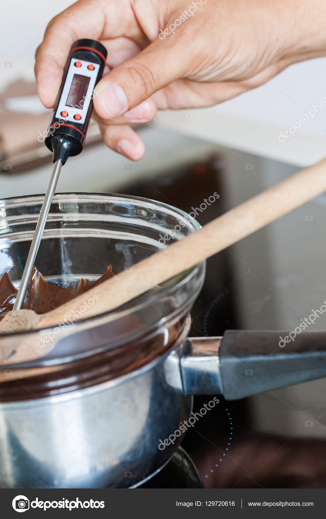 Tempering Delicious Chocolate Stock Photo by ©NatashaPhoto 129720616