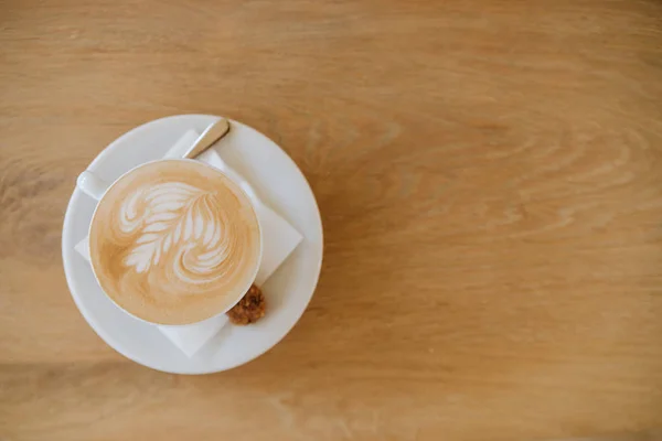 Café sobre fondo de madera —  Fotos de Stock