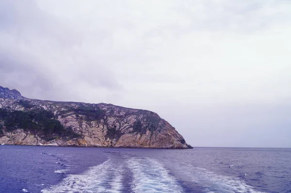 Montecristo Island from the sea, Tuscany, Italy Royalty Free Stock Images