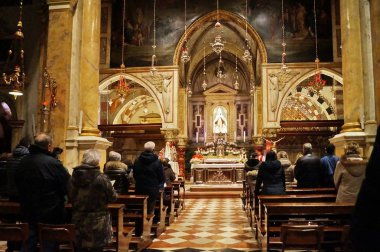 Vicenza, Italy, 2017 december 28, Interior of the church of the Sanctuary of Monte Berico in the evening clipart