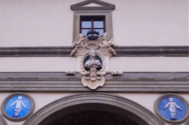 Detail of the facade of the Institute of the Innocent Piazza Santissima Annunziata in Florence, Italy clipart