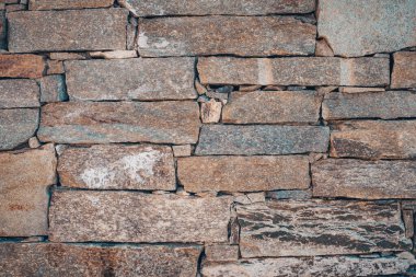 Açık bej renkli taş duvar kiremitleri. Duvar dokusu ve deseni.