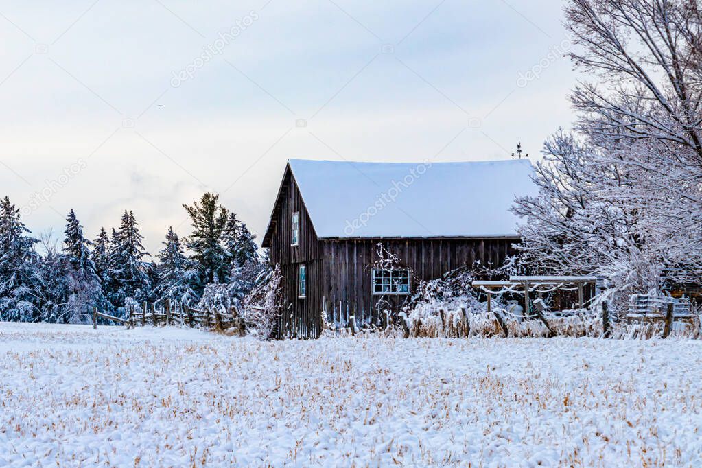 Snowy Wooden Barn in the Winter