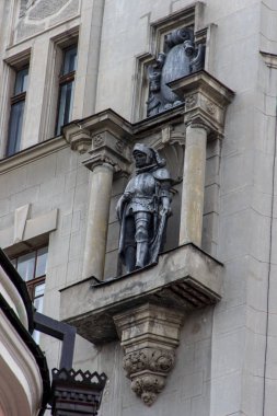 Moscow, Russia - September,16, 2016: The figure of a knight on the Arbat, located on the facade of the building opposite the Vakhtangov Theater.