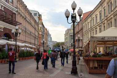 Moscow, Russia - September, 12, 2016: Tourists walk along the Arbat - the most famous pedestrian street in Moscow.
