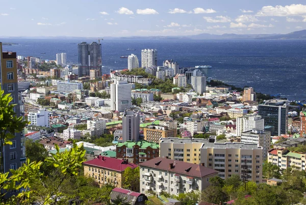 Vladivostok, Russia, September, 18, 2019: Panorama of the central part of the city of Vladivostok from the top of the Eagle's Nest hill on a clear sunny day.