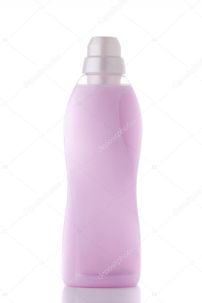 Pink color fabric softener on background