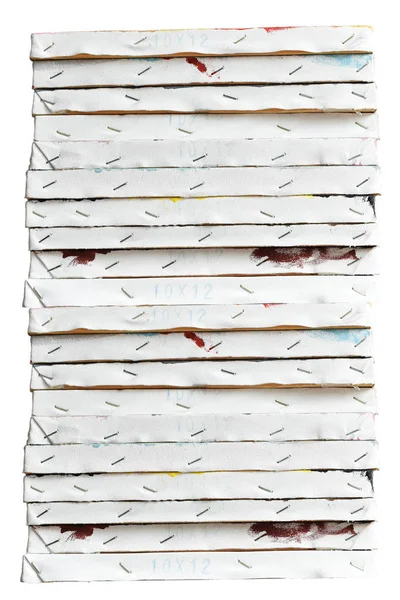 Stacked of painting canvas isolated on background