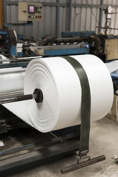 Rolling process of plastic sack — Stock Photo, Image