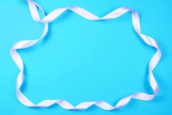 Rosafarbenes Band auf blauem Hintergrund für Ihren Schriftzug — Stockfoto