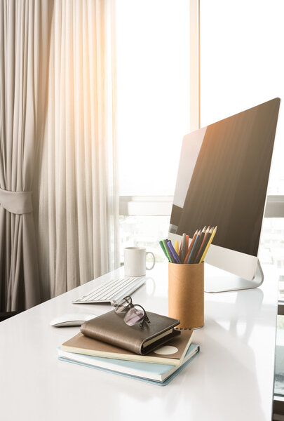 Manager Table with Desktop Computer and Business Notes