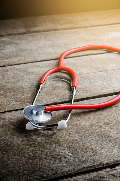 Stethoscope on wooden table — Stock Photo, Image