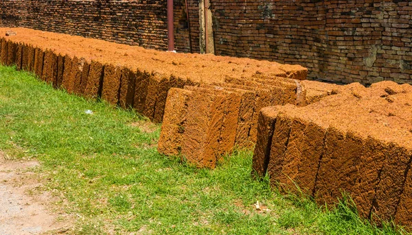 Laterite stone quarry. Laterite is a soft rock extensively used — Stock Photo, Image