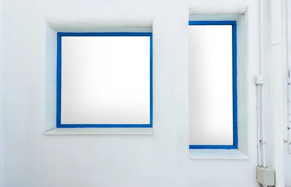 Blue window on Mallorca mediterranean white wall — Stock Photo, Image
