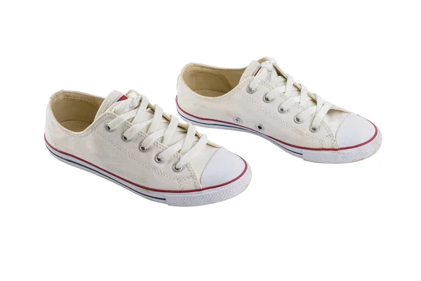 Zapatos de lona blanca aislados sobre fondo blanco — Foto de Stock