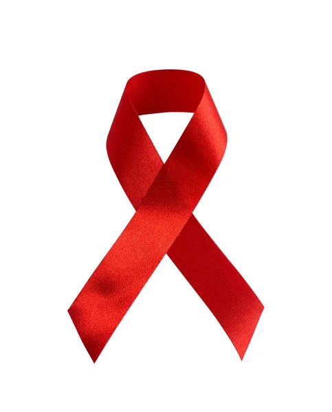 Red ribbon symbolic bow color raising awareness on people living — Stock Photo, Image