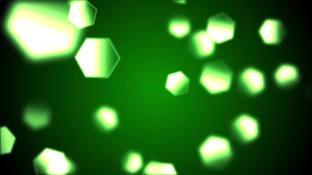 繊細な緑の六角形のボケ ライトのアニメーションがスローモーションで抽象的な背景は — ストック動画