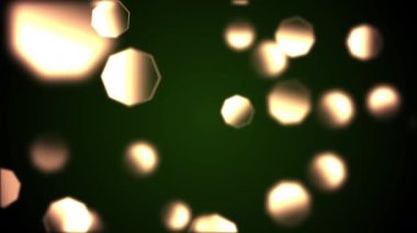 Arka plan ile animasyon yavaş hareket hassas yeşil turuncu Octagon bokeh ışıkların. 4k