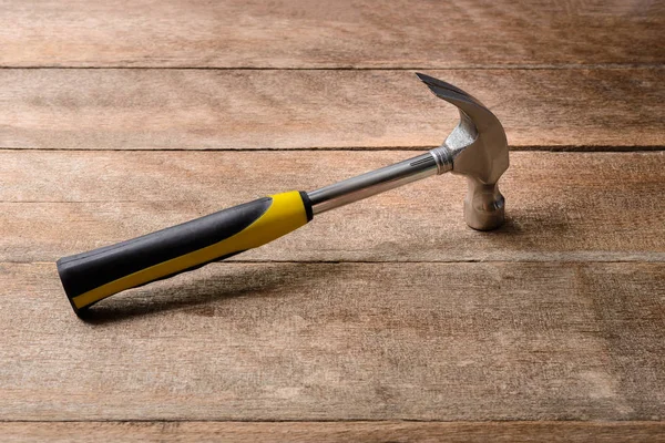 Hammer on wooden background — Stock Photo, Image