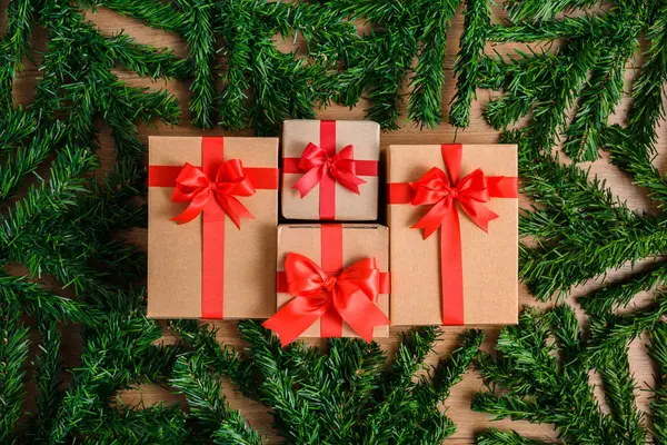 Christmas fir tree with decoration on wooden board — Stock Photo, Image