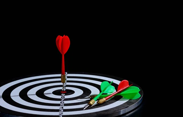 Red and green dart arrow hitting target center is Dart board Iso — Stock Photo, Image