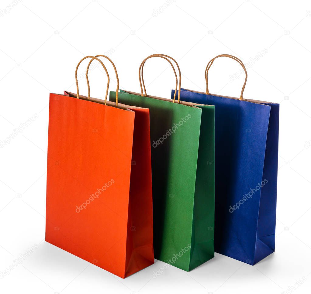 Group of colorful paper shopping bags isolated on white backgrou