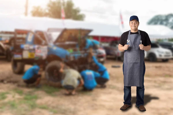 Male Auto mechanic hand holding wrench — Stock Photo, Image